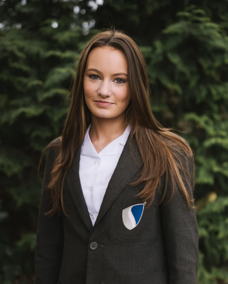A senior school smiling student