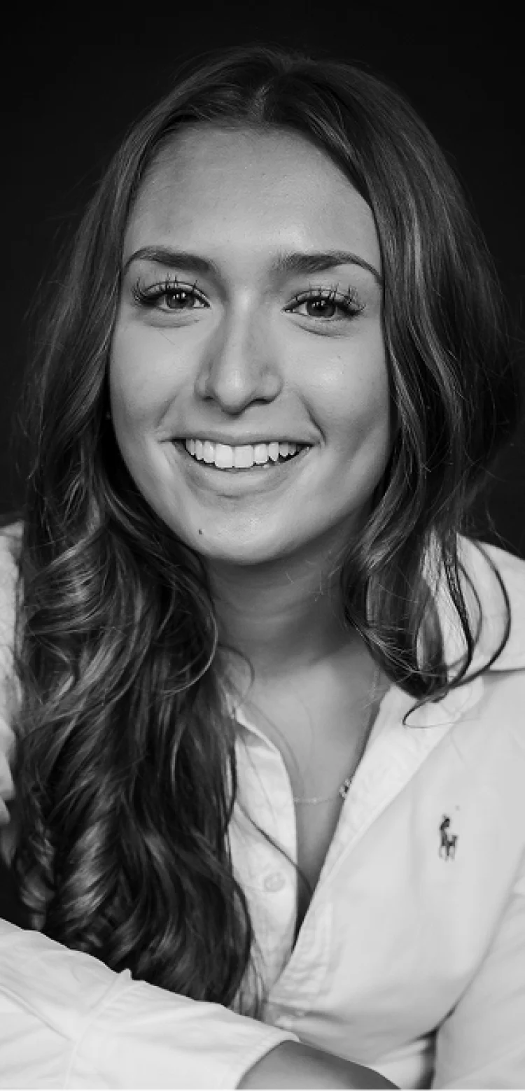 A smiling sixth form student