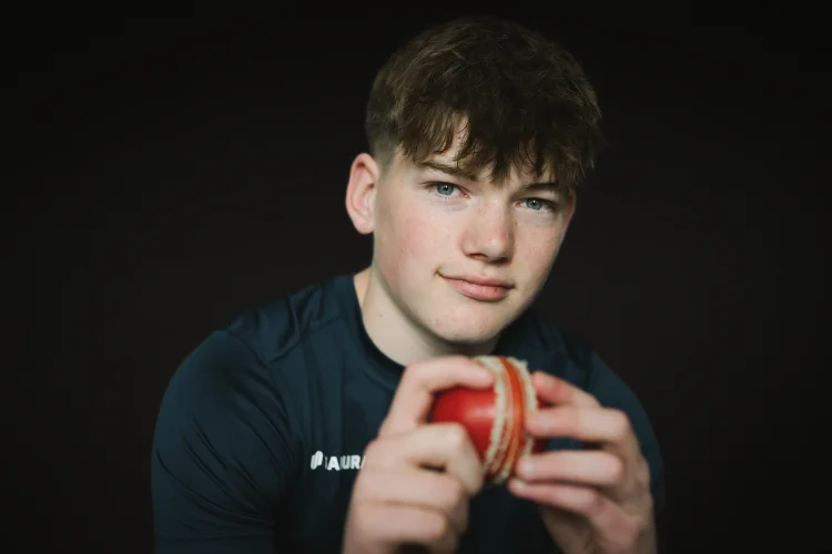 Senior School Pupil with cricket ball