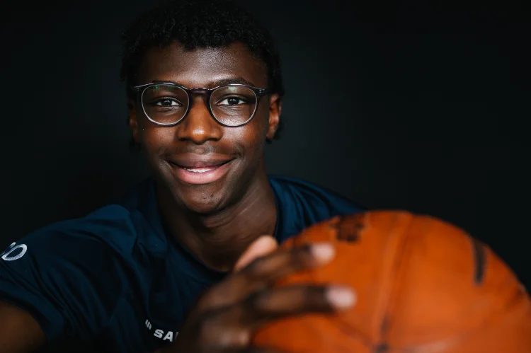 Sixth Form pupil with basketball